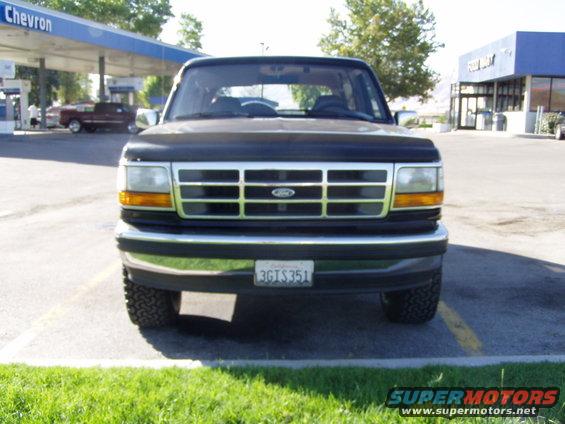 1994 Ford Bronco front view parked at a gas station