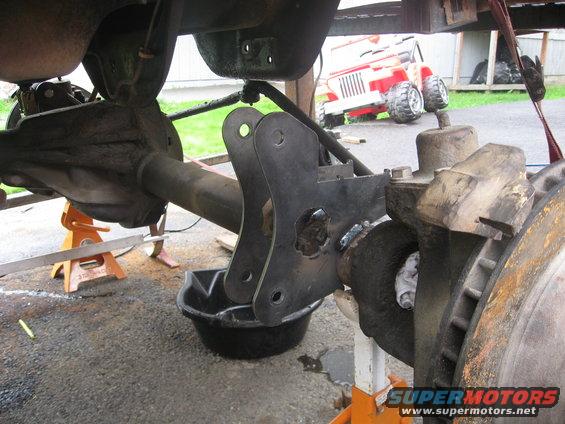 Rear axle assembly with custom bracket, close-up view
