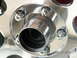 1983 Ford Bronco - Close-up of front hubs coated and chrome wheel nuts. Hub is coated in 'Jet-Hot' coating, used to give show finish to ex…
