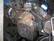 1978 Ford F-250 - Engine components showing signs of wear and tear, with a focus on the block and pulley system.