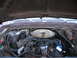 1978 Ford F-250 - The engine bay is visible with the hood open, revealing the engine components and wiring.