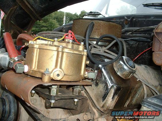 Engine bay with brass propane converter and air filter