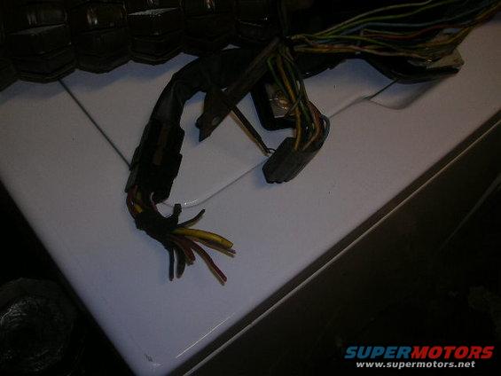 Automotive wiring harness with exposed wires and connectors
