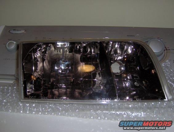 Headlight part on a washing machine