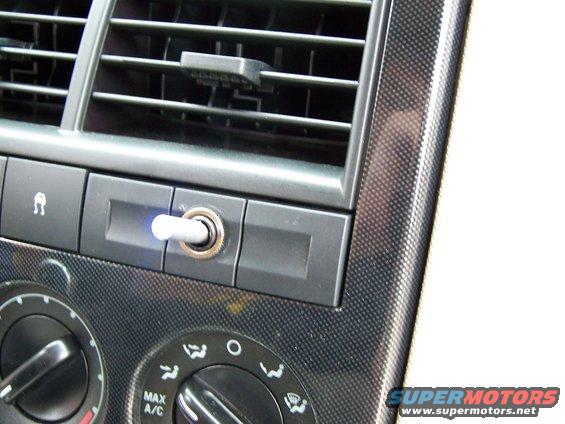 Interior dashboard with toggle switch and climate controls