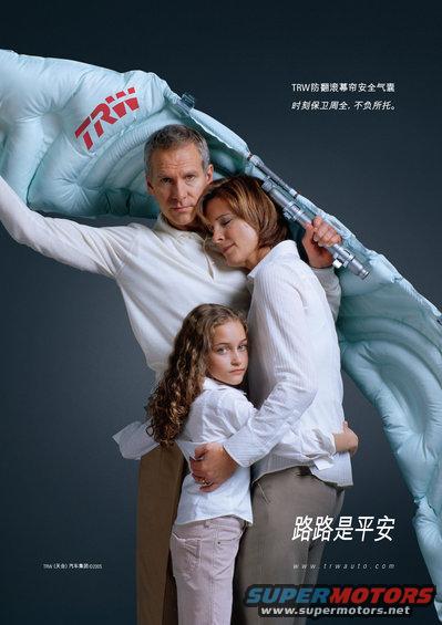 Family huddled under a deployed TRW airbag