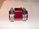 1993 Mazda MX-3 - A red aluminum hose fitting with screw clamps is shown on a white surface.