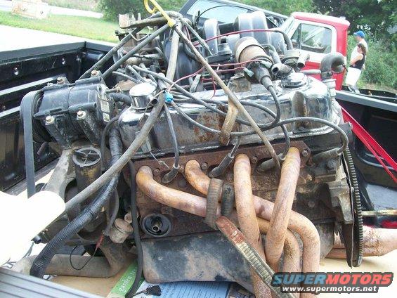 Engine with rusty exhaust manifolds and wiring harnesses