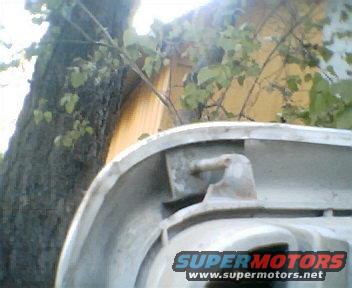 Chrome bumper detail with SuperMotors logo