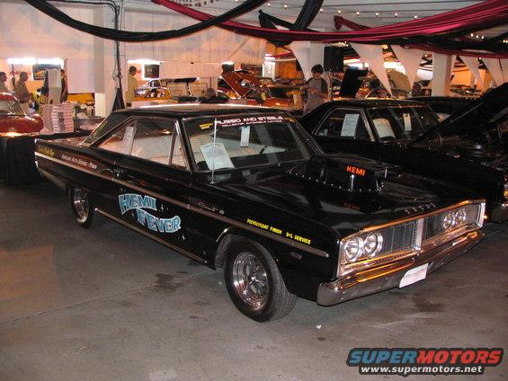 Black 1967 Dodge Coronet R/T with HEMI FEVER graphics and hood scoop