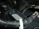 1977 Ford F-150 - Close-up view of interior air vents and ducting, showing foam inserts and a black hose.