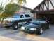 1996 Ford Bronco - 5.8 next to the 5.0