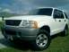 2002 Ford Explorer - Front 3/4 view of a white 2002 Ford Explorer SUV.