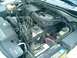 2002 Ford Explorer - Engine bay of a 2002 Ford Explorer, the 4.0L SOHC V6 engine.