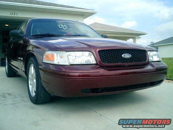 Replaced the Factory slotted grille with a grille from the P71 Police issue and painted the outside edges to match the body color Dark Toreador Red