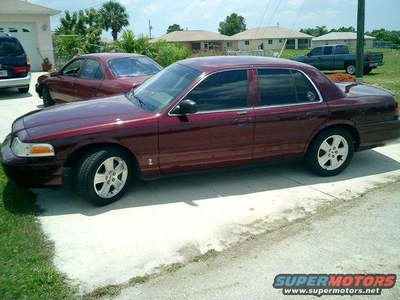Background cars are the inlaws

Geo Prizm, and Mercury Villager