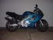 2004 Yamaha FZR600 - Side view of a blue 2004 Yamaha FZR600 sport motorcycle with black accents.