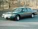 1995 Mercury Grand Marquis - Late winter 2006 at a park in Albany, NY. Note snow tires and original 15 inch alloys. (Low res camera)