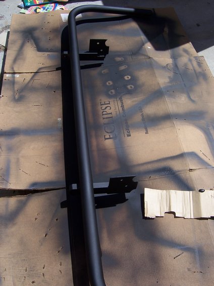 Black metal tube bumper on cardboard with Eclipse logo