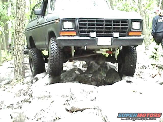 1978 Ford Bronco front grille and tires on rocks