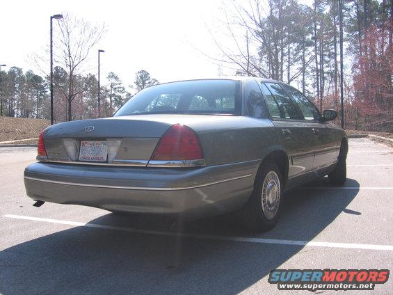 Rear view of a 2000 Ford Crown Victoria parked in a lot