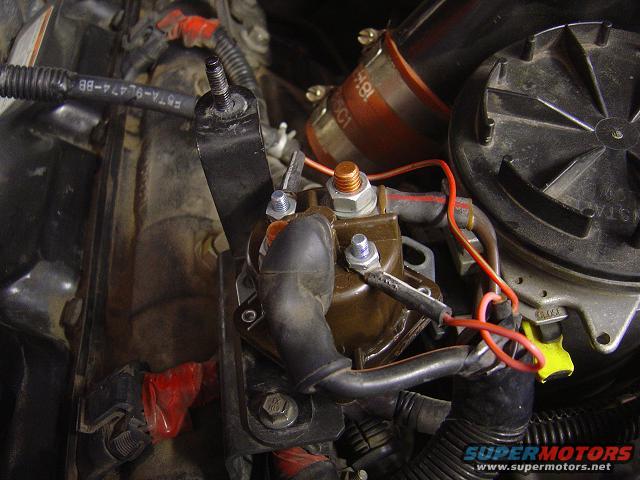 Starter solenoid and wiring in an engine bay