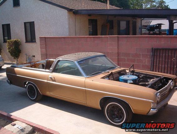 im000308.jpg First started working on it.  No hood, tailgate paint, engin work, new tires... nothing