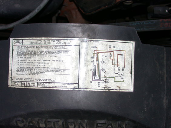 Ford Motor Company sticker with vacuum hose routing diagram and vehicle information for a 1987 model year vehicle