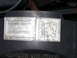 1987 Lincoln Town Car - A sticker on a black surface provides important vehicle information and a vacuum hose routing diagram.