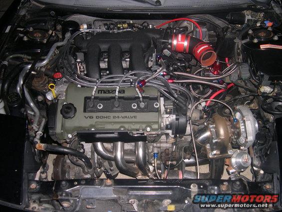 Mazda V6 DOHC 24-valve engine with turbocharger and custom intake piping