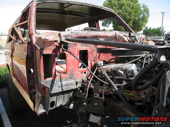 1986 Ford Bronco chassis with engine visible, front view