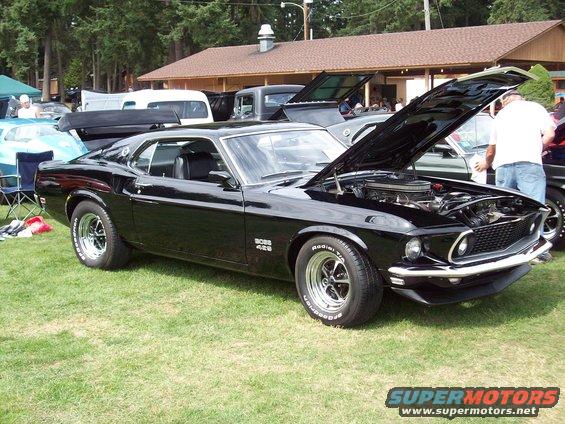 Black 1969 Ford Mustang Boss 429 with hood open