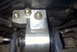 1994 Dodge Stealth - Close-up view of an aftermarket aluminum engine motor mount assembly.