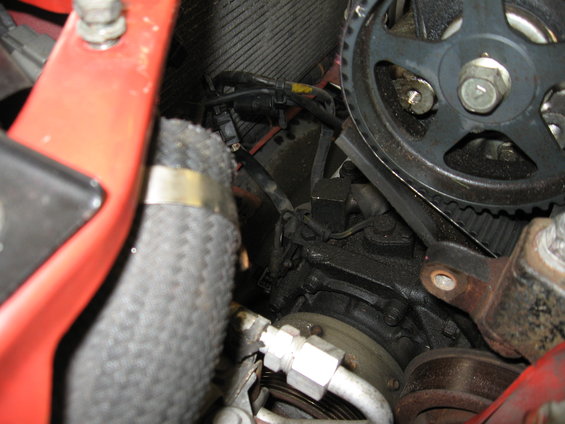 Engine timing belt and pulleys close-up