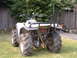 1994 Yamaha TIMBERWOLF - An all-terrain vehicle is parked on the lawn, with two bicycles visible behind it.