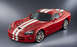 1991 Mazda RX-7 - A red sports car with white racing stripes is shown from a 3/4 front angle against a grey background.