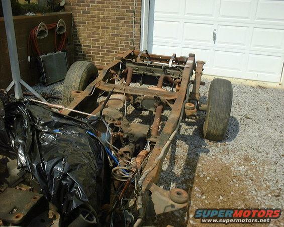 1978 Ford Bronco chassis, side view, rusted