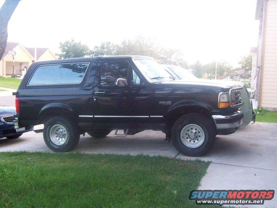 Black 1993 Ford Bronco parked on driveway