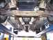 1978 Ford Mustang II - Undercarriage view reveals a dual exhaust system and steering rack, with no visible year-specific details.