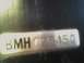 1984 Chevrolet Corvette - A close-up of a VIN plate shows the alphanumeric code BMH 02F450.