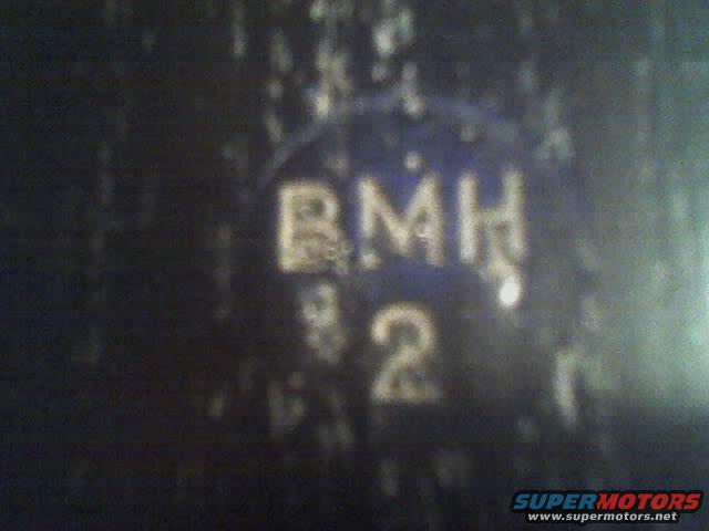 Part with blue circle showing text 'BMH' and the number '2'
