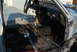 1982 Toyota 4Runner - The interior of a vehicle is shown with the floor stripped bare and the dashboard visible.