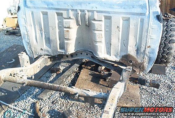 Truck bed and frame assembly, rear view. Visible text: www.supermotors.net