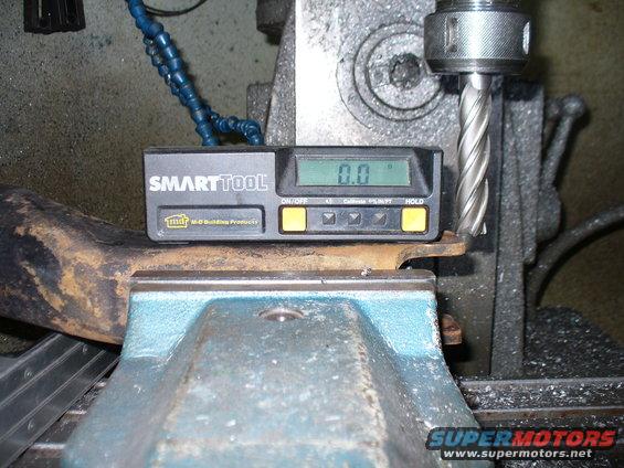 Shock/trackbar bracket set up in mill