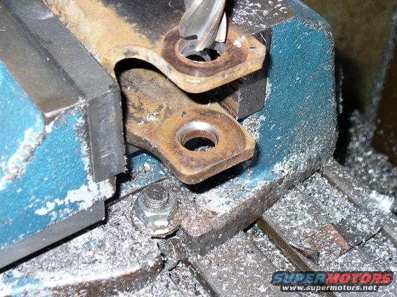 New holes milled offset to old holes to keep material on bottom of hole from getting too thin