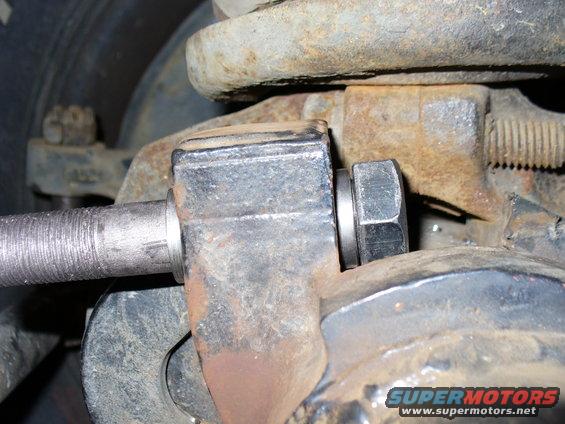 Bolt in axle bracket with bushings