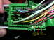 2007 Mazda 3 - Close-up of a green wiring harness connector with various colored wires and labeled pins for Pin K, Pin D, and Pin B.