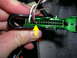 2007 Mazda 3 - Wiring harness connector with labeled pin X, showing black and red wires.
