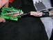 2007 Mazda 3 - A close-up view of a green wiring harness connector with multiple colored wires bundled together.