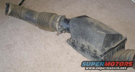 Ford air intake assembly with ribbed hose and black plastic housing